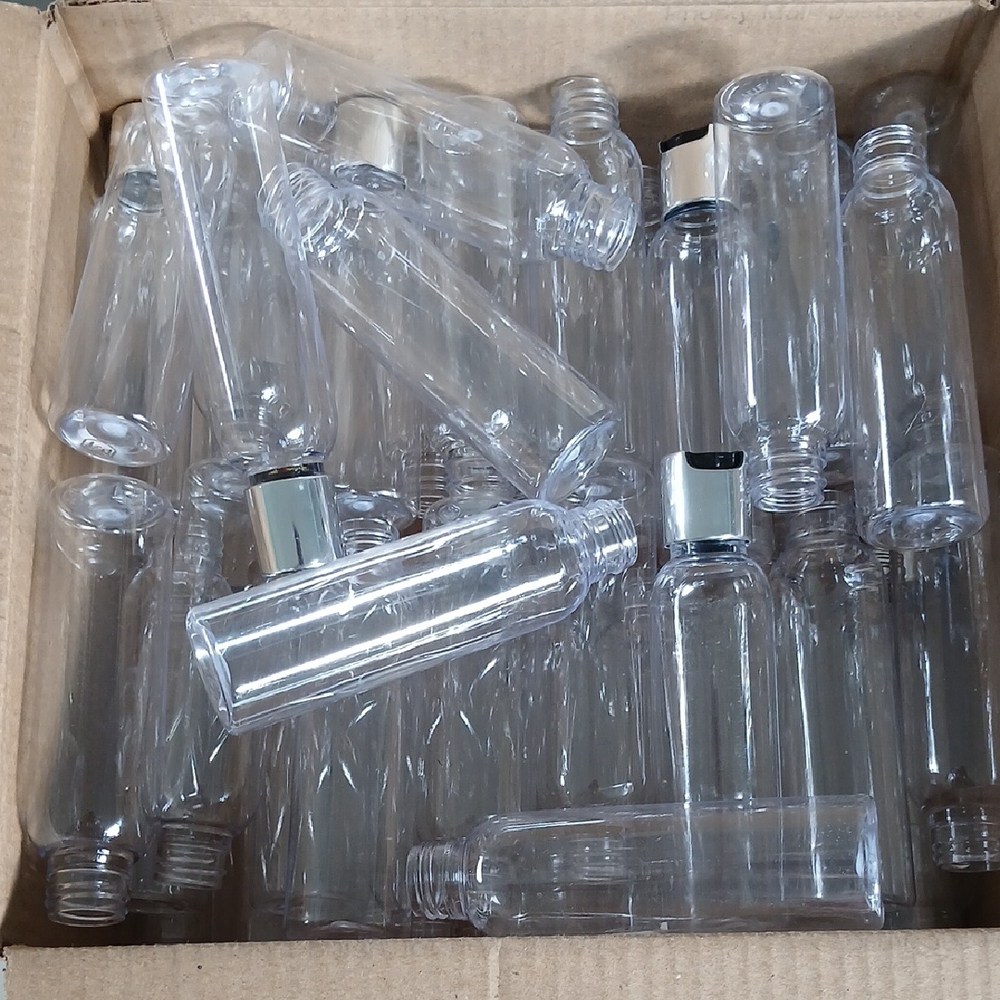 Clear Plastic Bottles with Silver Caps